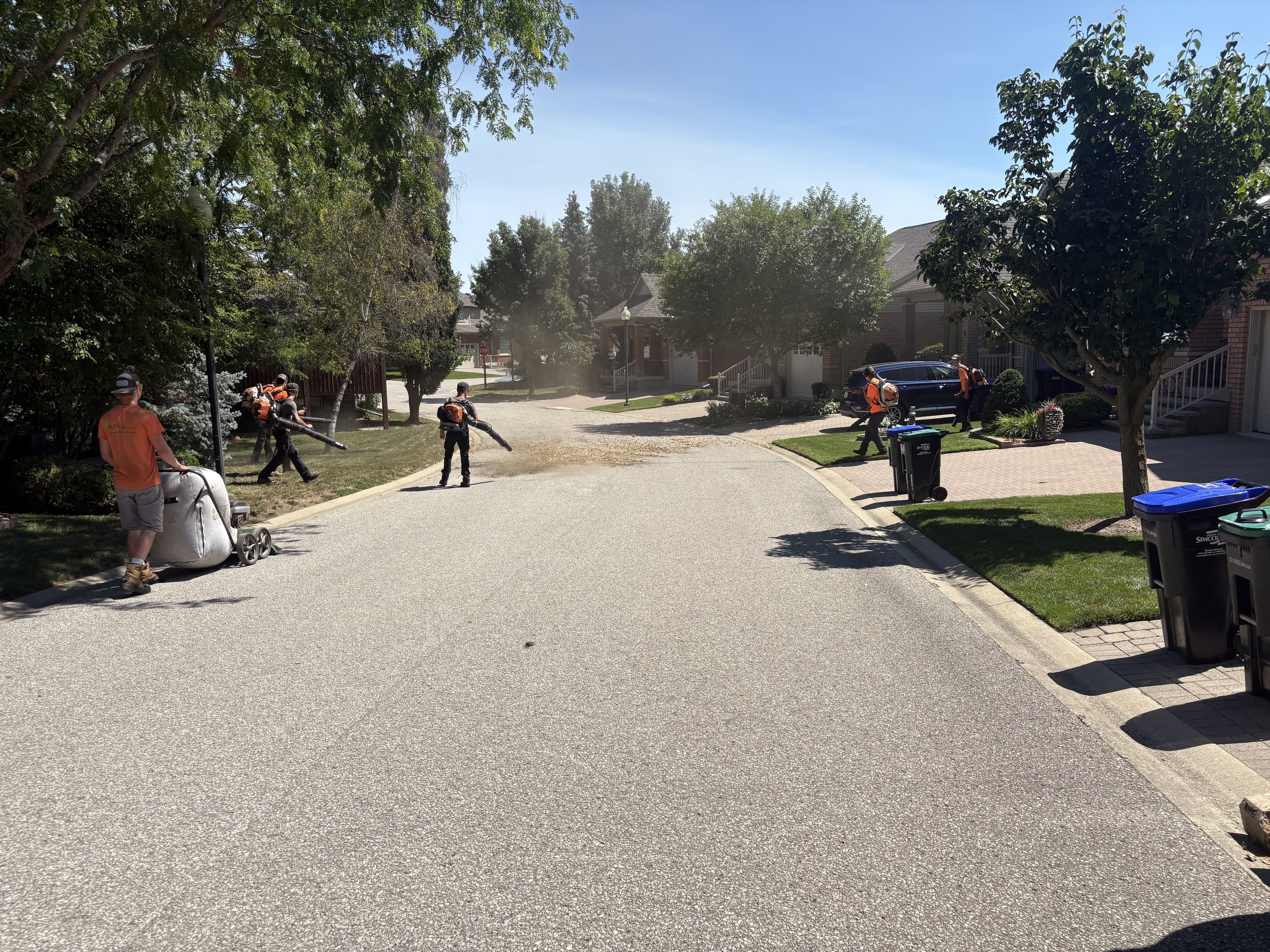 KJS crew with leaf blowers during fall cleanup